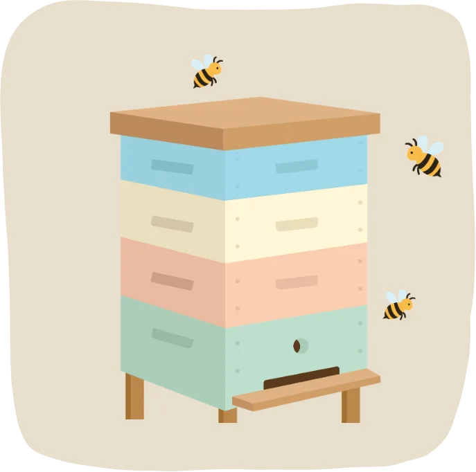 a pastel beehive with three bees flying around it